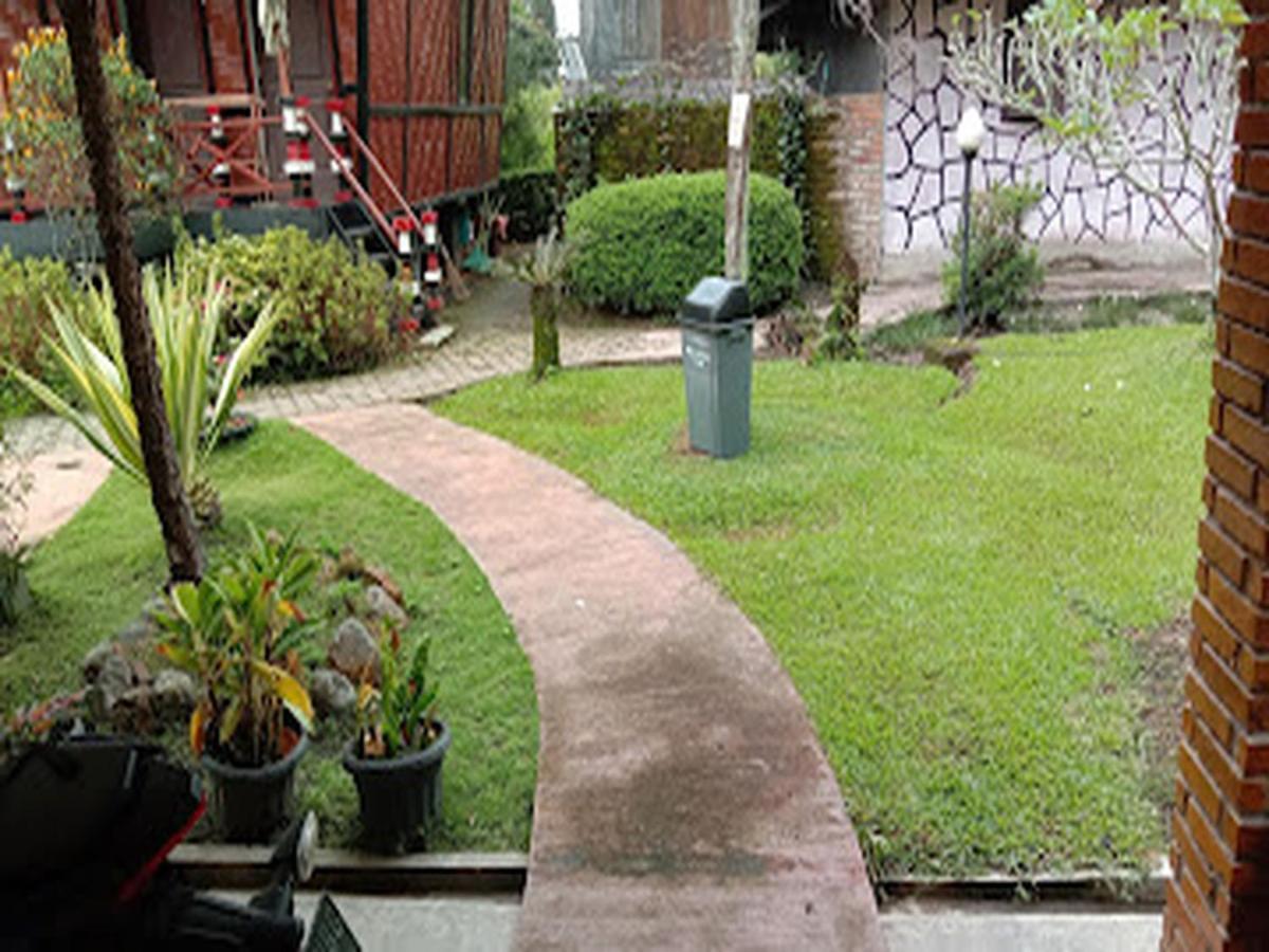Roman Sinasi Hotel Tongging Exterior photo