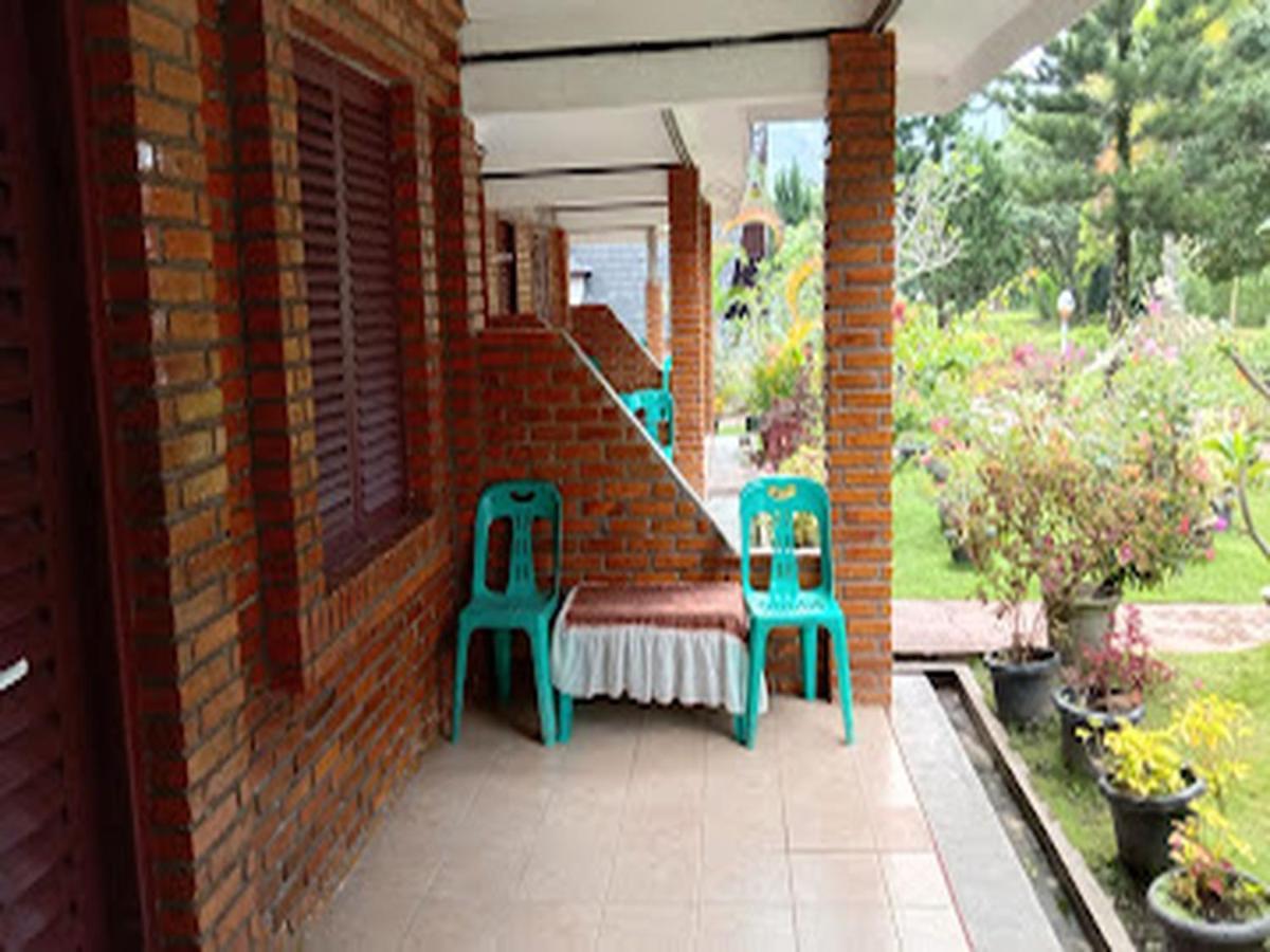 Roman Sinasi Hotel Tongging Exterior photo